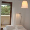 Apartamenty Ustka - Apartament Pod Sosnami - Z sypialni można również wyjść na balkon